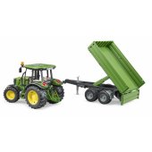 John Deere 5115 M with tipping trailer